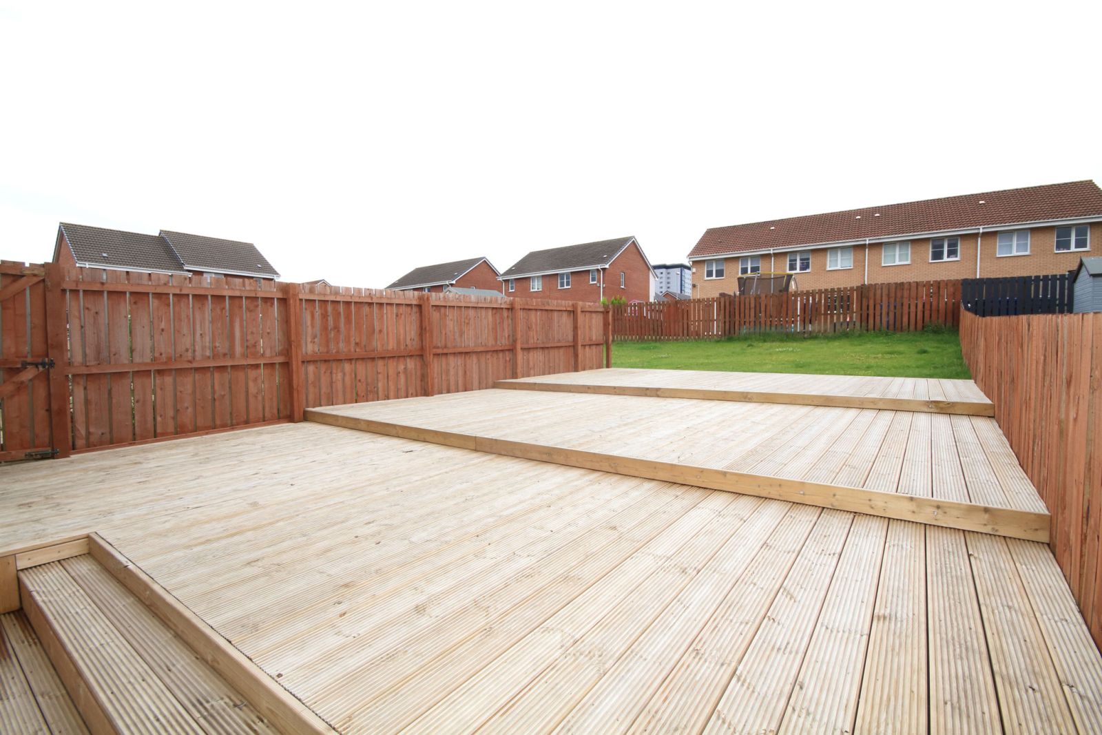a large wooden decking with steps